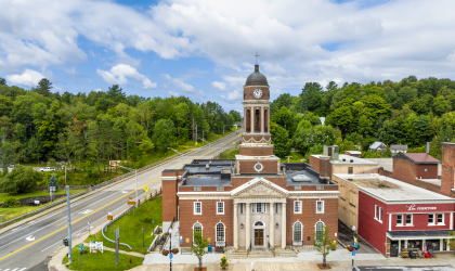 An aerial view of the clock tower at the Harrietstown Town Hall.