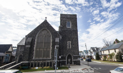 Exterior of the tall grey stone church