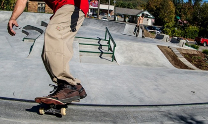 Close up of feet on a skateboard