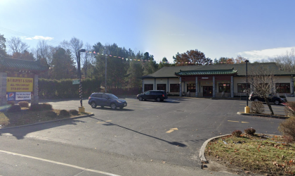 The exterior and large parking area at A-1 Buffet & Sushi